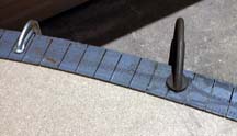 Photo of rail with cuts